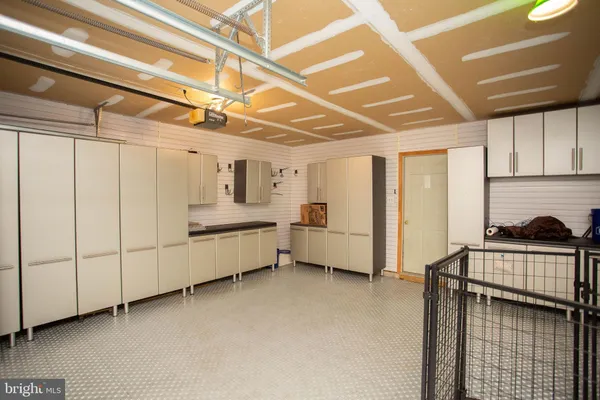 a utility room with cabinets