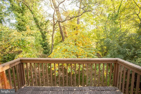 a view of a wooden fence and floor