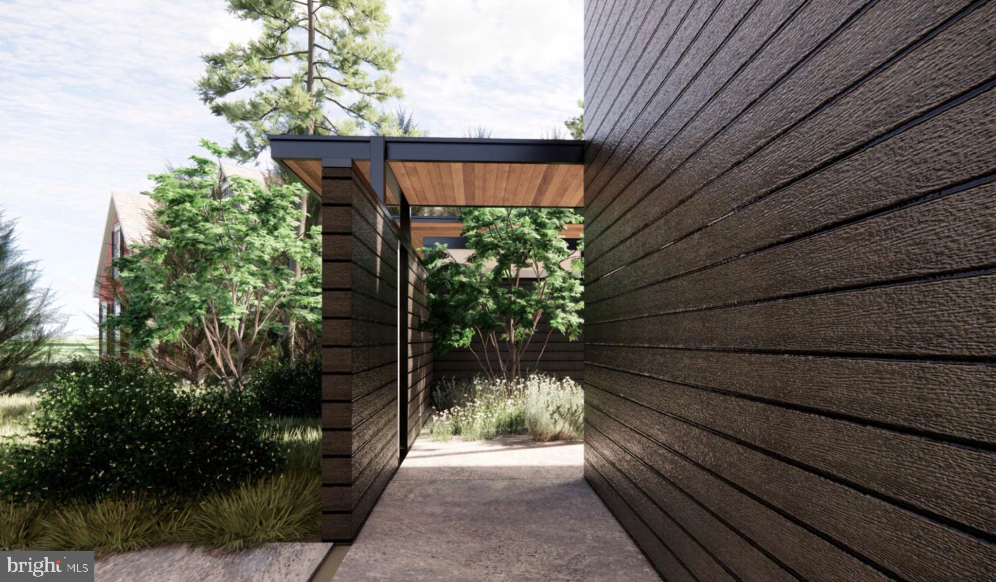 9433 Ferry Landing Court Alexandria, VA 22309 - Photo 17 of 23 Modern pathway framed by lush greenery.