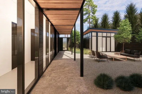 a view of a porch with a floor to ceiling window