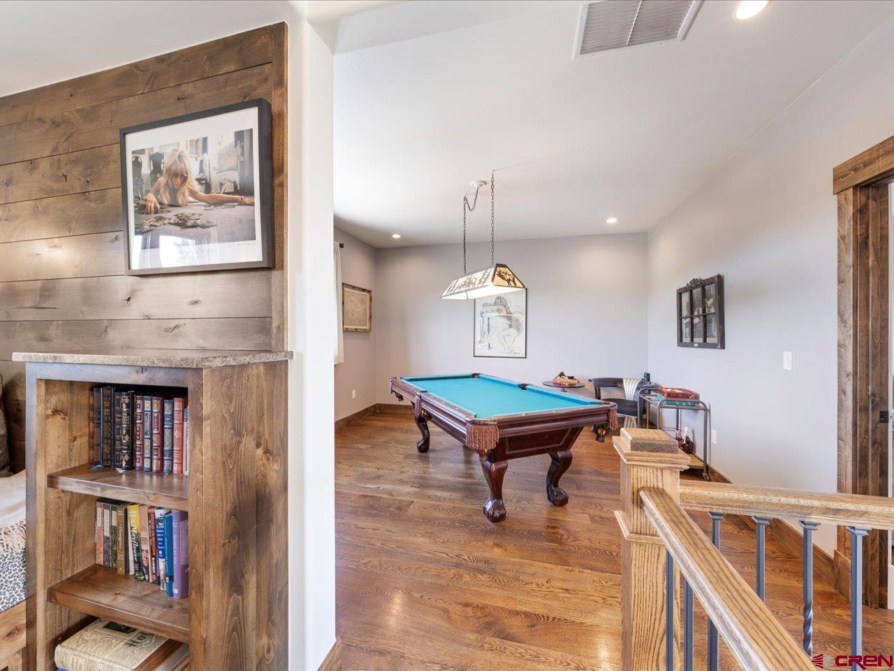 810 Pine Drive Ridgway, CO 81432 - Photo 22 of 36 a room with furniture and a book shelf