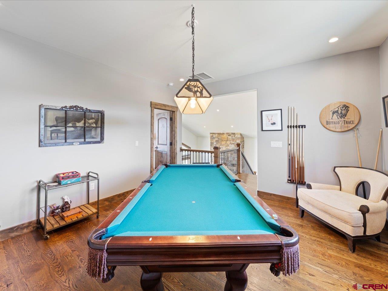 810 Pine Drive Ridgway, CO 81432 - Photo 24 of 36 a room with pool tables and windows