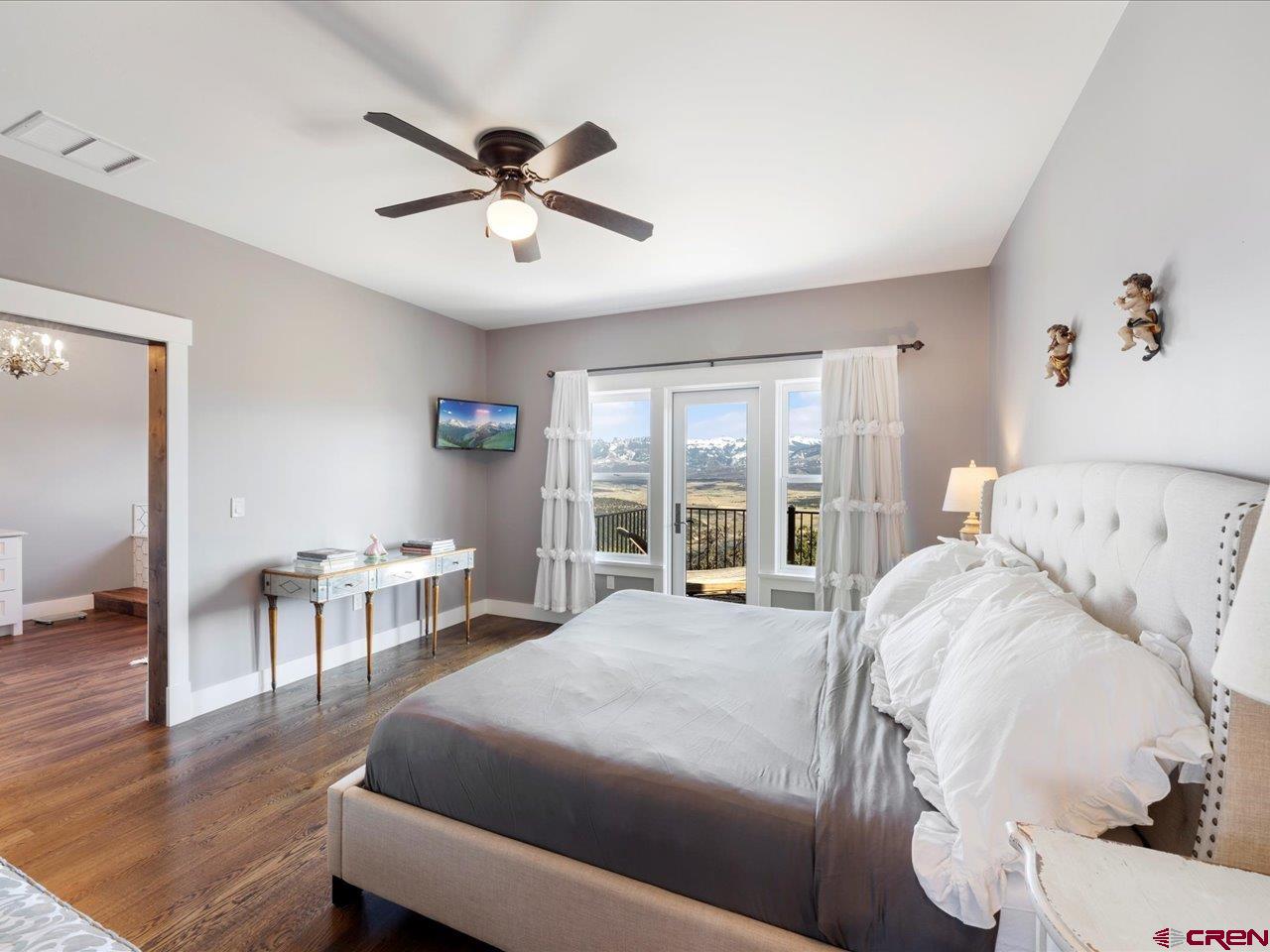 810 Pine Drive Ridgway, CO 81432 - Photo 25 of 36 a large white bed in a white room
