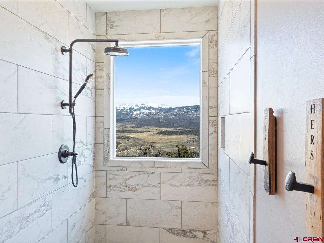 810 Pine Drive Ridgway, CO 81432 - Photo 28 of 36 a bathroom with a bathtub and shower