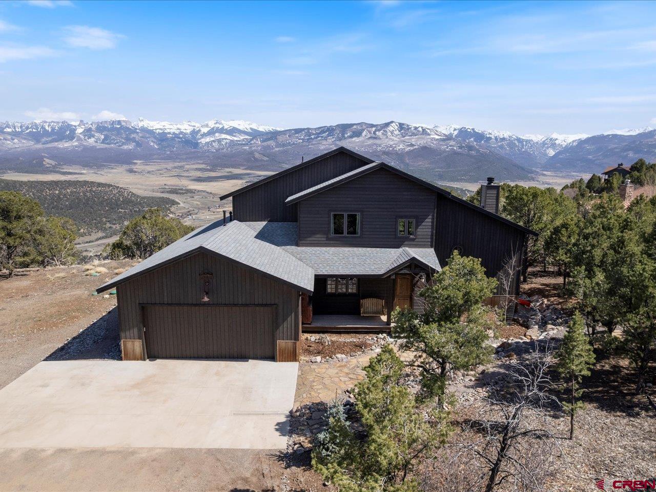 810 Pine Drive Ridgway, CO 81432 - Photo 3 of 36 a view of a house with a yard