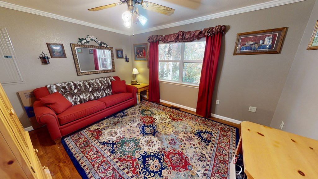 52 Bear Track Road Andrews, NC 28901 - Photo 11 of 38 a living room with furniture and a rug