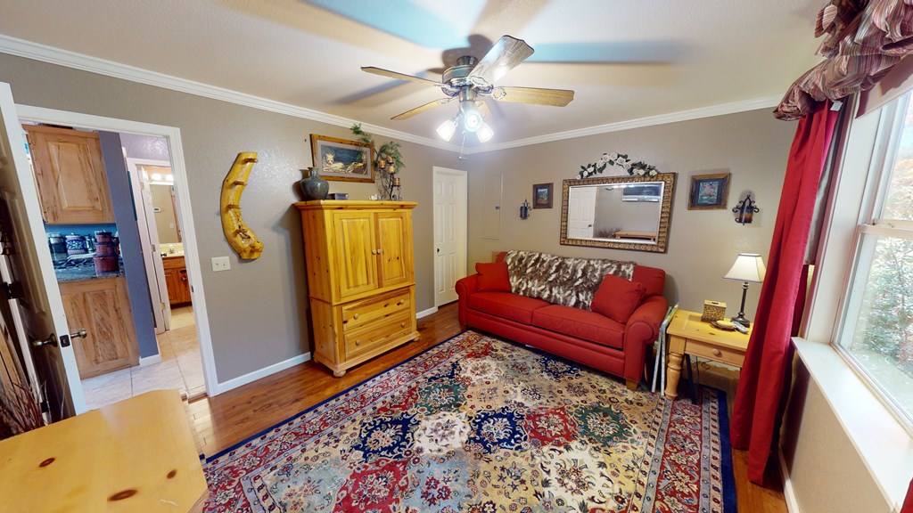 52 Bear Track Road Andrews, NC 28901 - Photo 12 of 38 a living room with furniture and a rug