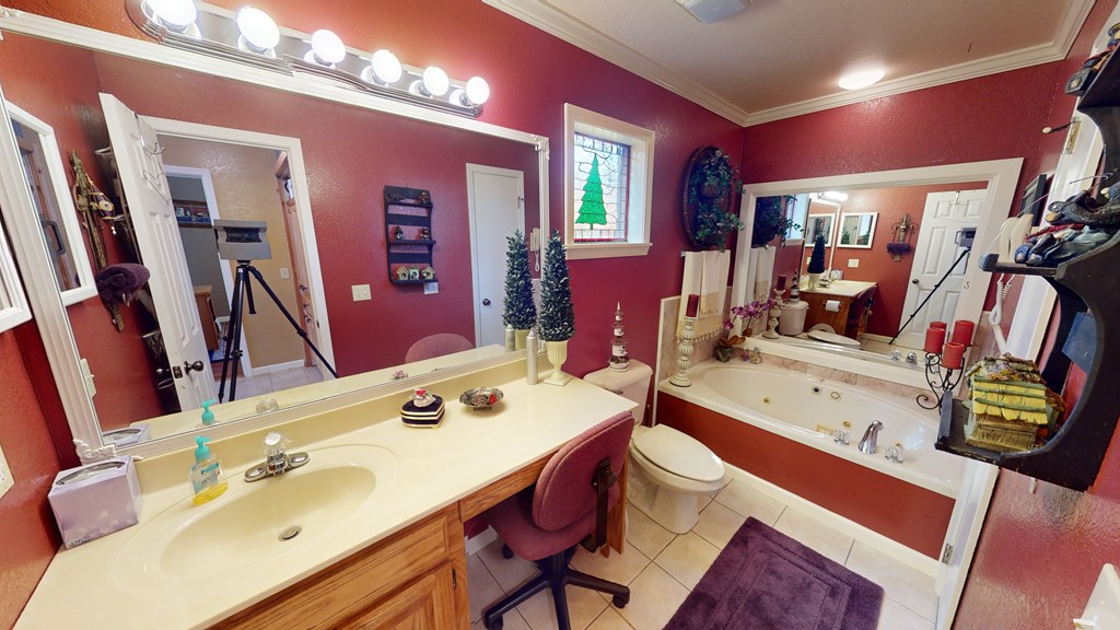 52 Bear Track Road Andrews, NC 28901 - Photo 14 of 38 a en suite bathroom with a double vanity sink and a mirror