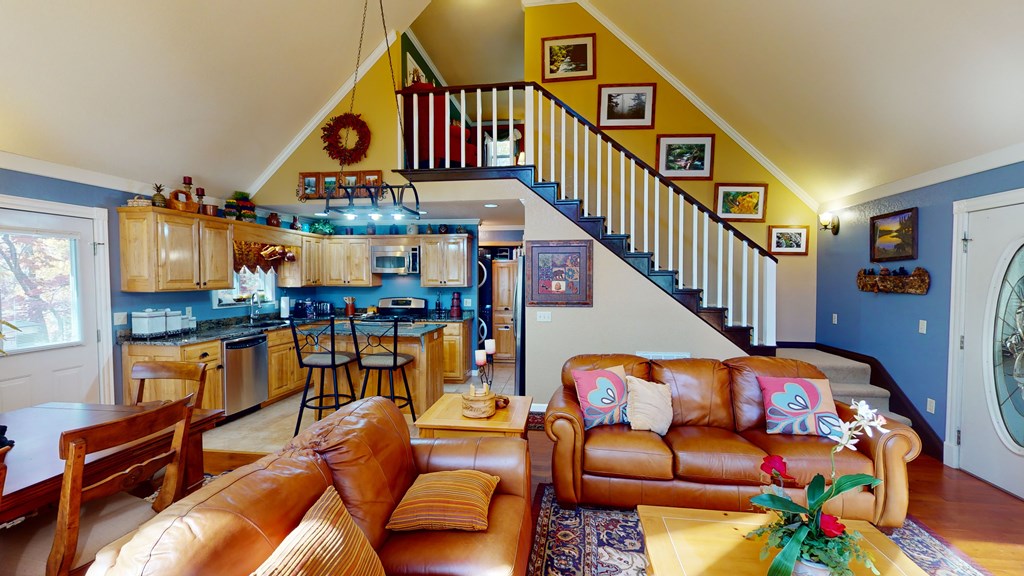 52 Bear Track Road Andrews, NC 28901 - Photo 19 of 38 a bedroom with furniture and a book shelf