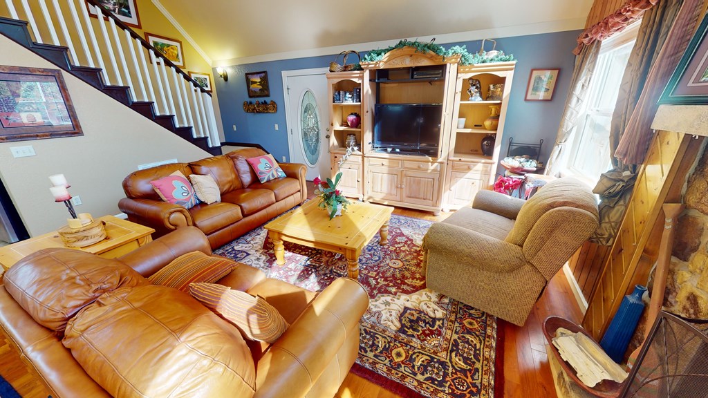 52 Bear Track Road Andrews, NC 28901 - Photo 20 of 38 a bedroom with furniture and a floor to ceiling window