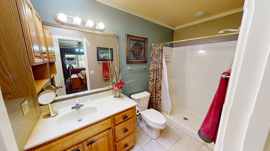 52 Bear Track Road Andrews, NC 28901 - Photo 24 of 38 a bathroom with a sink vanity mirror and toilet
