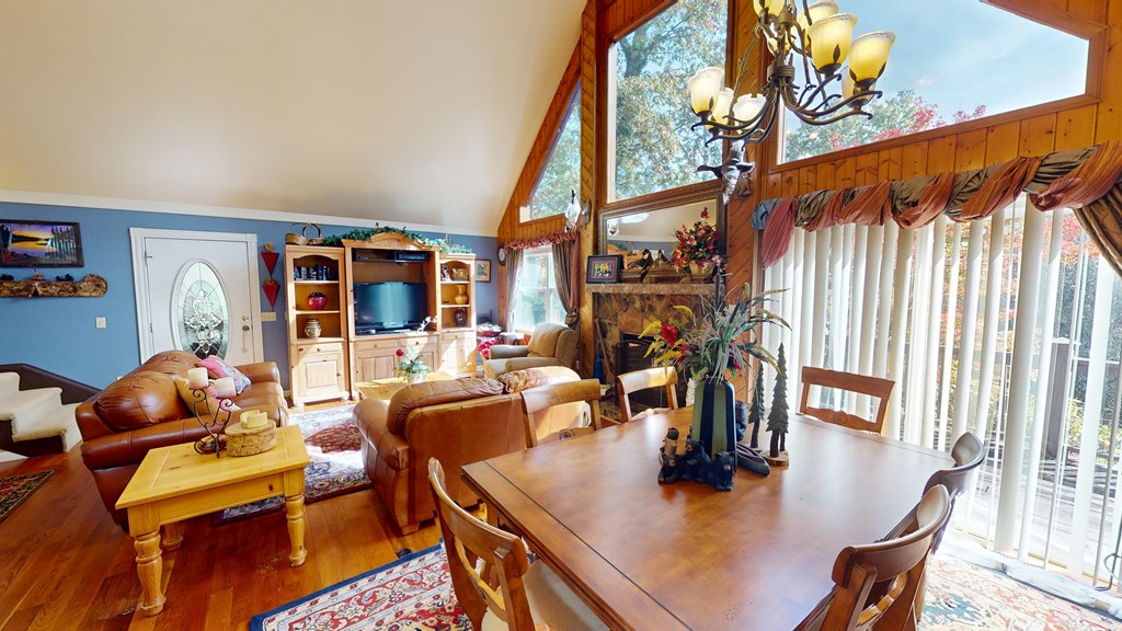 52 Bear Track Road Andrews, NC 28901 - Photo 6 of 38 a dining room with furniture and a floor to ceiling window