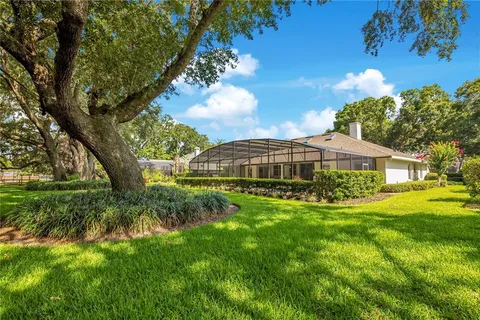 $825,000 | 7750 Apple Tree Circle, Orlando, FL 32819