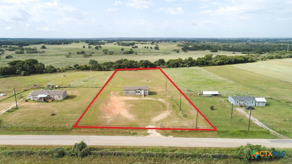 859 Ivy Switch Road Luling, TX 78648 - Photo 5 of 28 a view of a swimming pool and an ocean