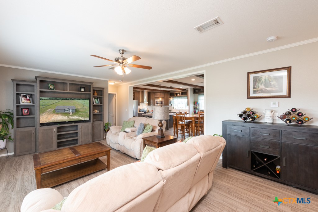 859 Ivy Switch Road Luling, TX 78648 - Photo 7 of 28 a living room with furniture and a flat screen tv