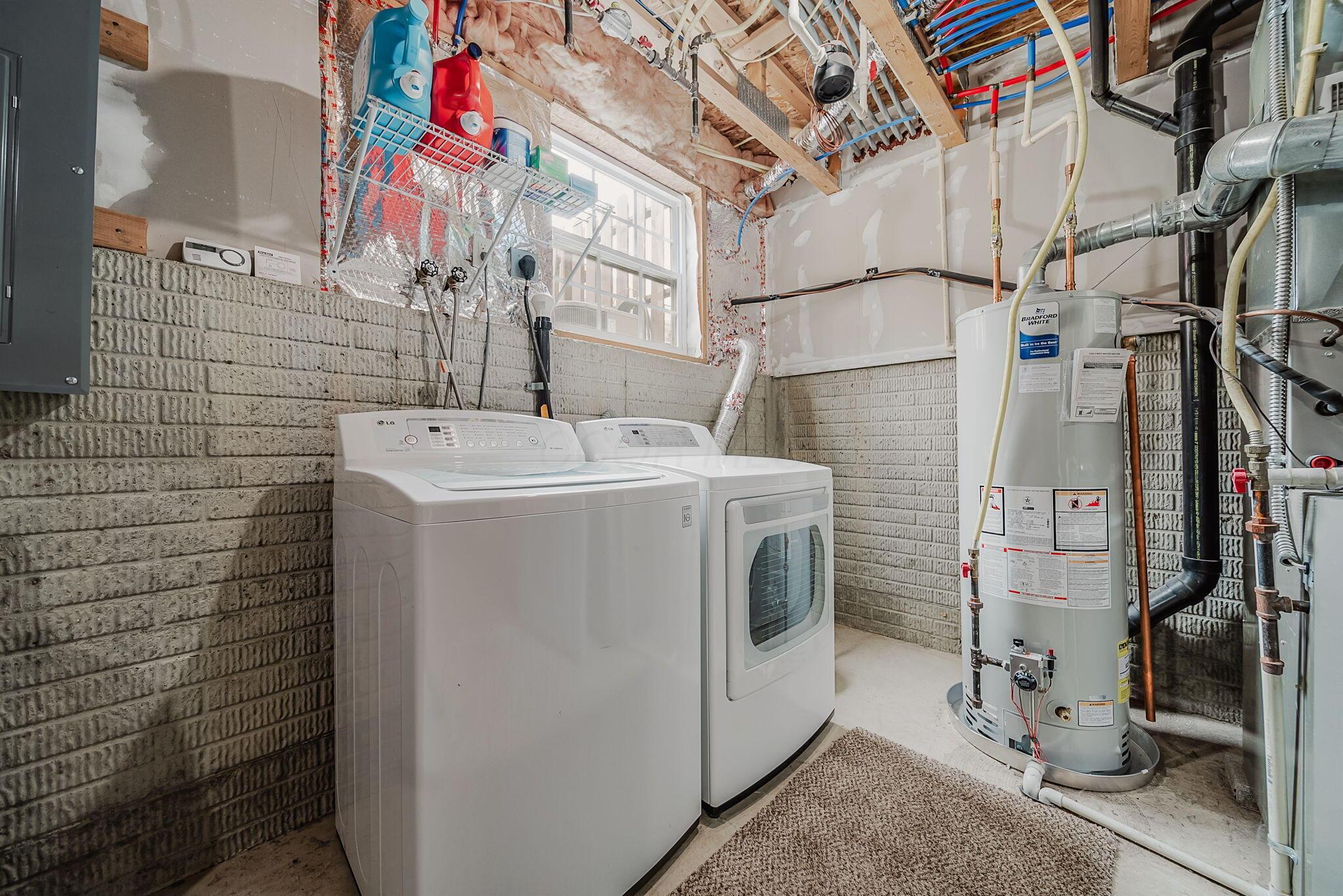 6186 Needletail Road, Unit 66 Columbus, OH 43230 - Photo 29 of 48 Unfinished section of lower level showcases ample storage, access to mechanicals, and washer dryer space!