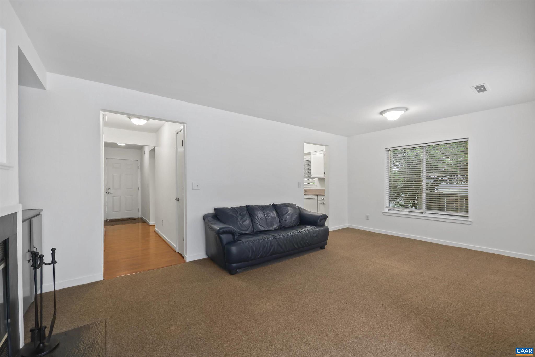 1250 Maple View Drive Charlottesville, VA 22902 - Photo 11 of 25 a living room with furniture and a window