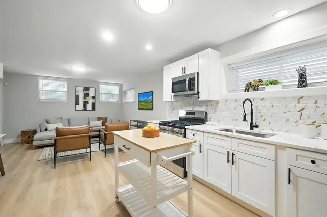 a bedroom with a bed and a desk