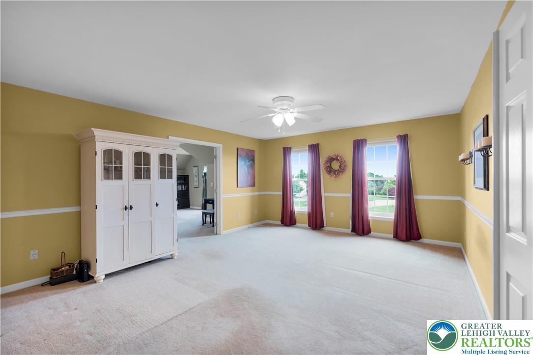 3830 McIntosh Drive Orefield, PA 18069 - Photo 14 of 36 an empty room with windows
