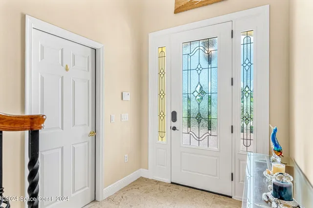 a view of a livingroom with furniture and a fireplace