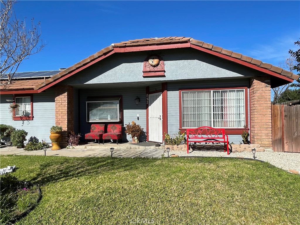 892 East Victoria Street Rialto, CA 92376 - Photo 1 of 1 a front view of a house with garden