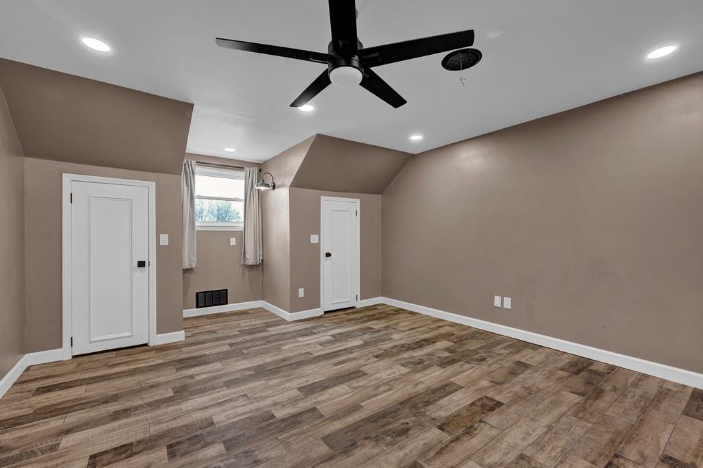 6117 Gainsborough Road Amarillo, TX 79106 - Photo 27 of 40 a view of an empty room with a chandelier