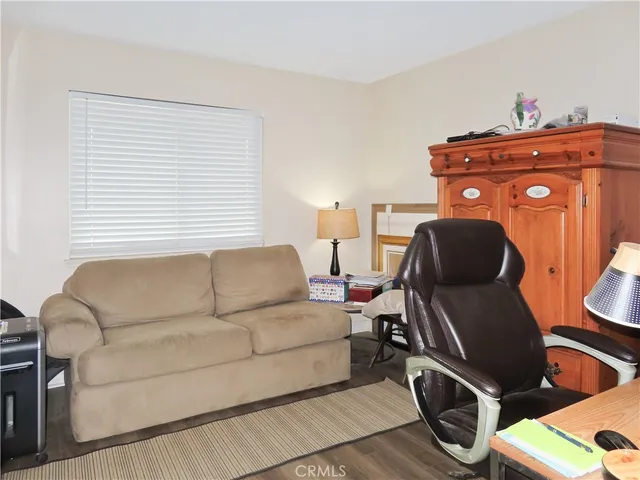 a view of a workspace with furniture