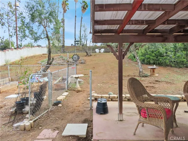 a wooden bench sitting in front of a building