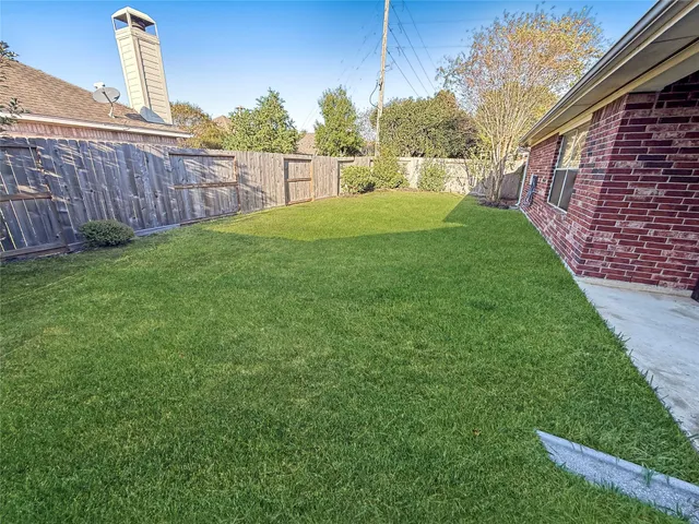 a view of a backyard with a garden