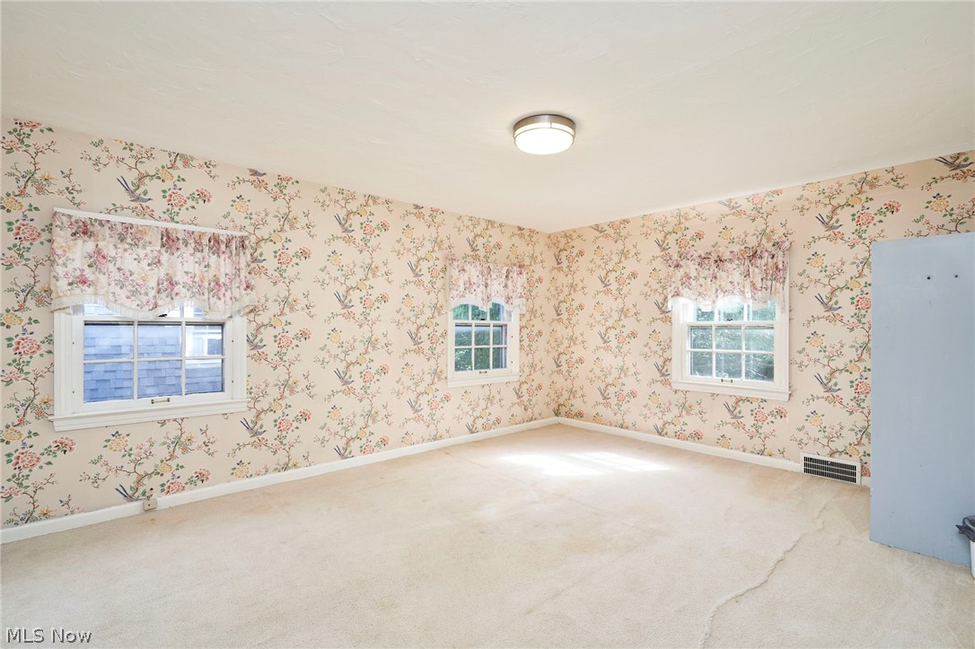 3676 Rawnsdale Road Beachwood, OH 44122 - Photo 12 of 20 Empty room with plenty of natural light and light carpet