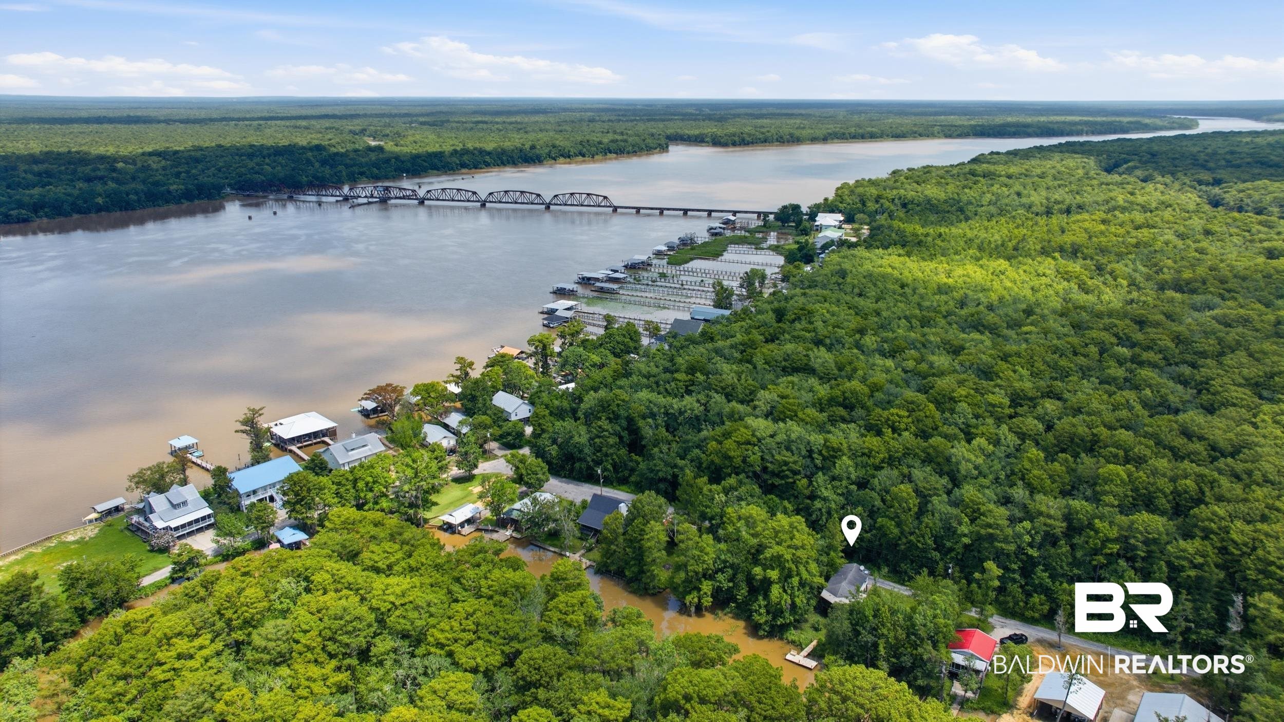 42080 Bayou Road Bay Minette, AL 36507 - Photo 32 of 43 Aerial perspective featuring a riverfront property amidst extensive mature tree coverage