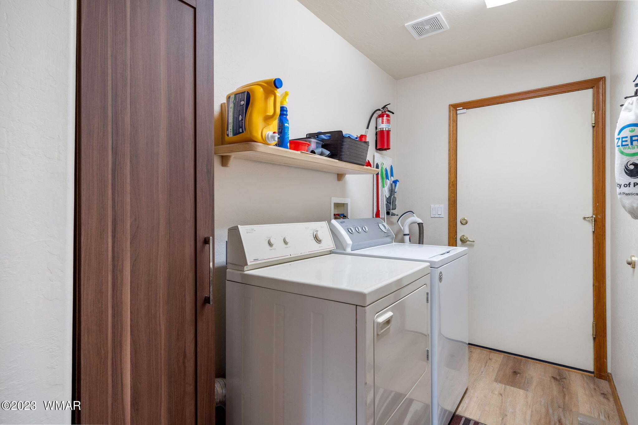 2231 Del Rio Circle Overgaard, AZ 85933 - Photo 22 of 36 a utility room with dryer and washer