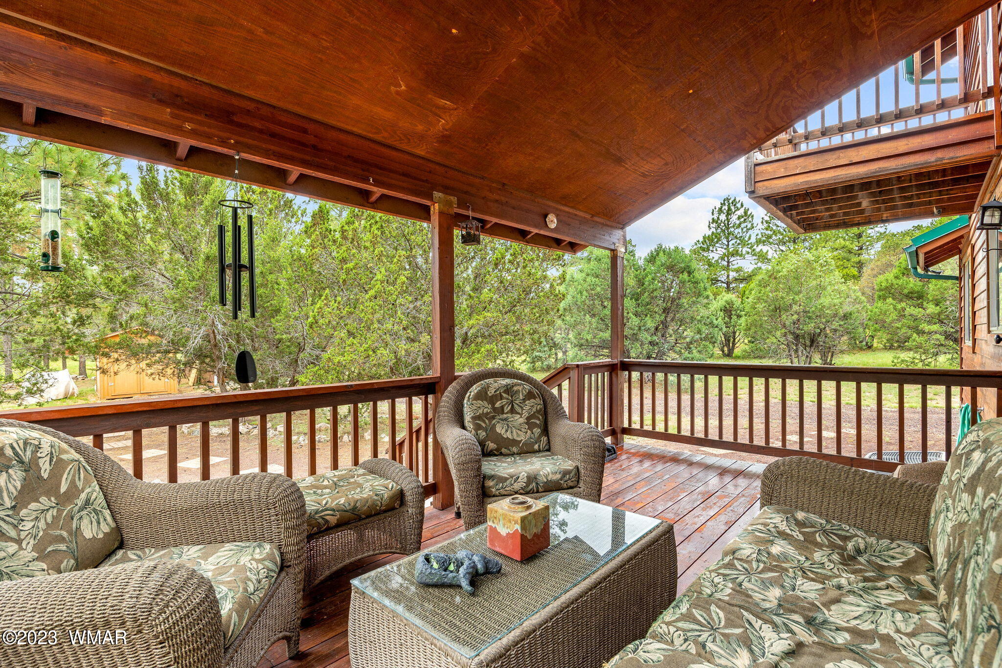 2231 Del Rio Circle Overgaard, AZ 85933 - Photo 25 of 36 a balcony with furniture and a potted plant