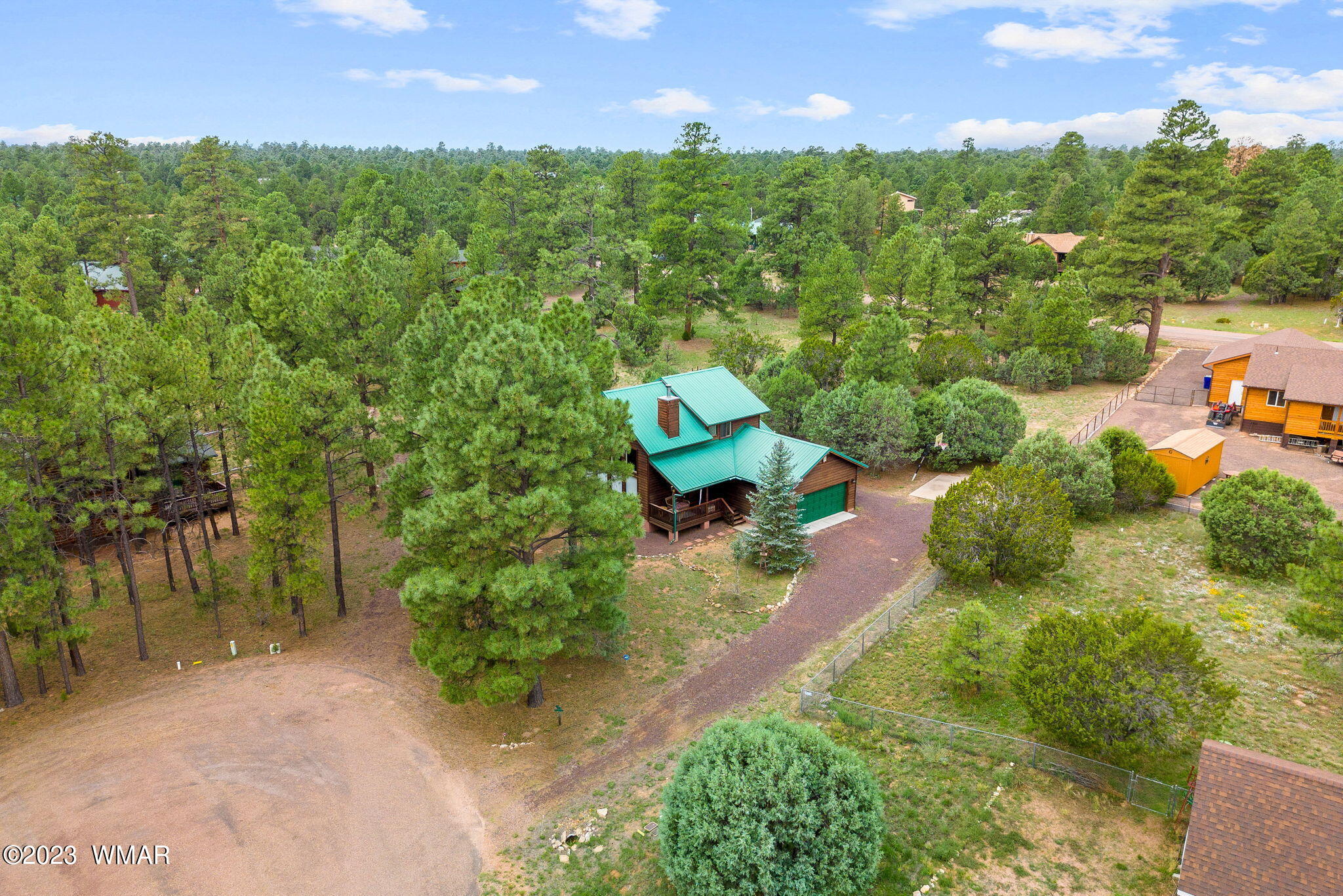 2231 Del Rio Circle Overgaard, AZ 85933 - Photo 31 of 36 an aerial view of a house with a yard basket ball court and outdoor seating