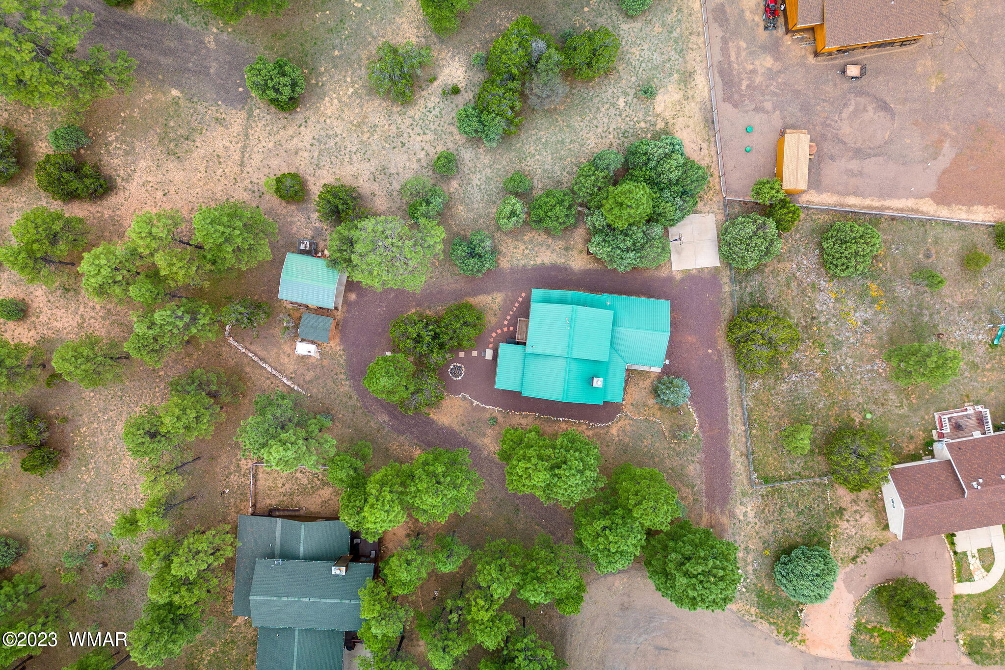 2231 Del Rio Circle Overgaard, AZ 85933 - Photo 34 of 36 an aerial view of a house with a yard