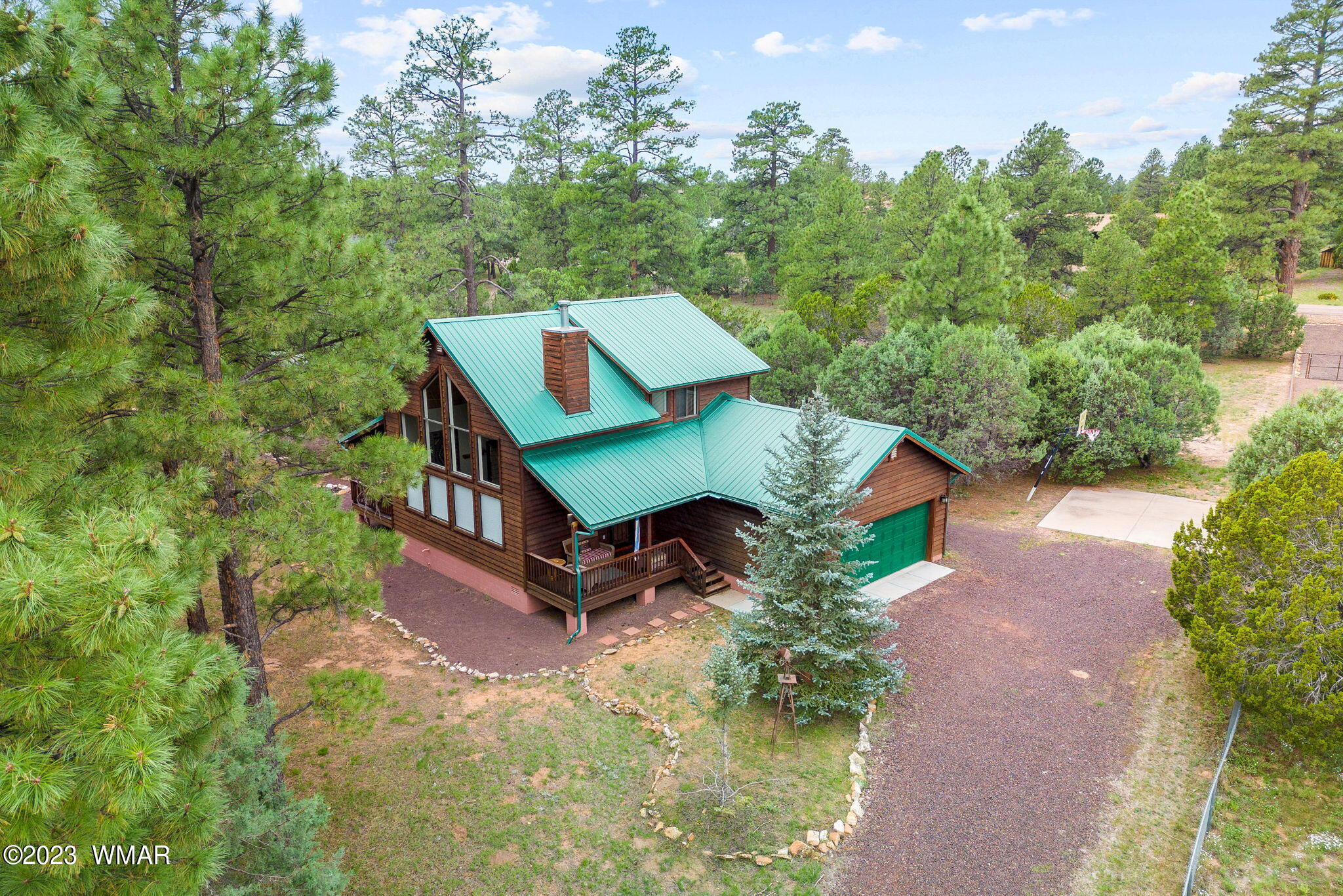 2231 Del Rio Circle Overgaard, AZ 85933 - Photo 36 of 36 an aerial view of a house with porch and a yard