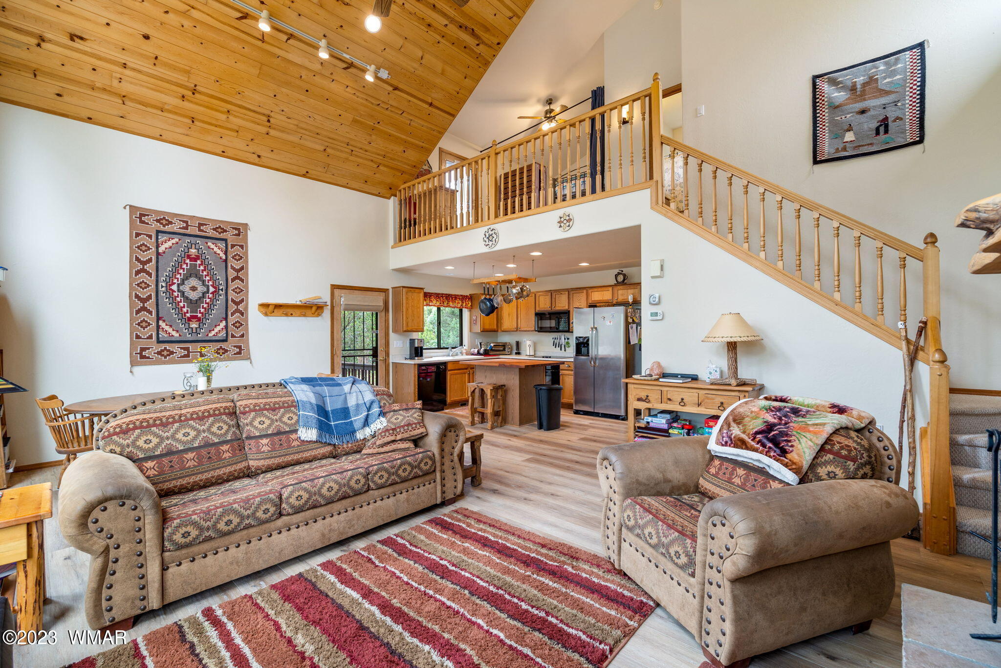 2231 Del Rio Circle Overgaard, AZ 85933 - Photo 7 of 36 a living room with furniture and a rug