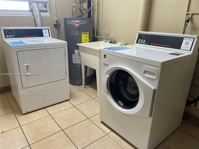 a utility room with dryer and washer