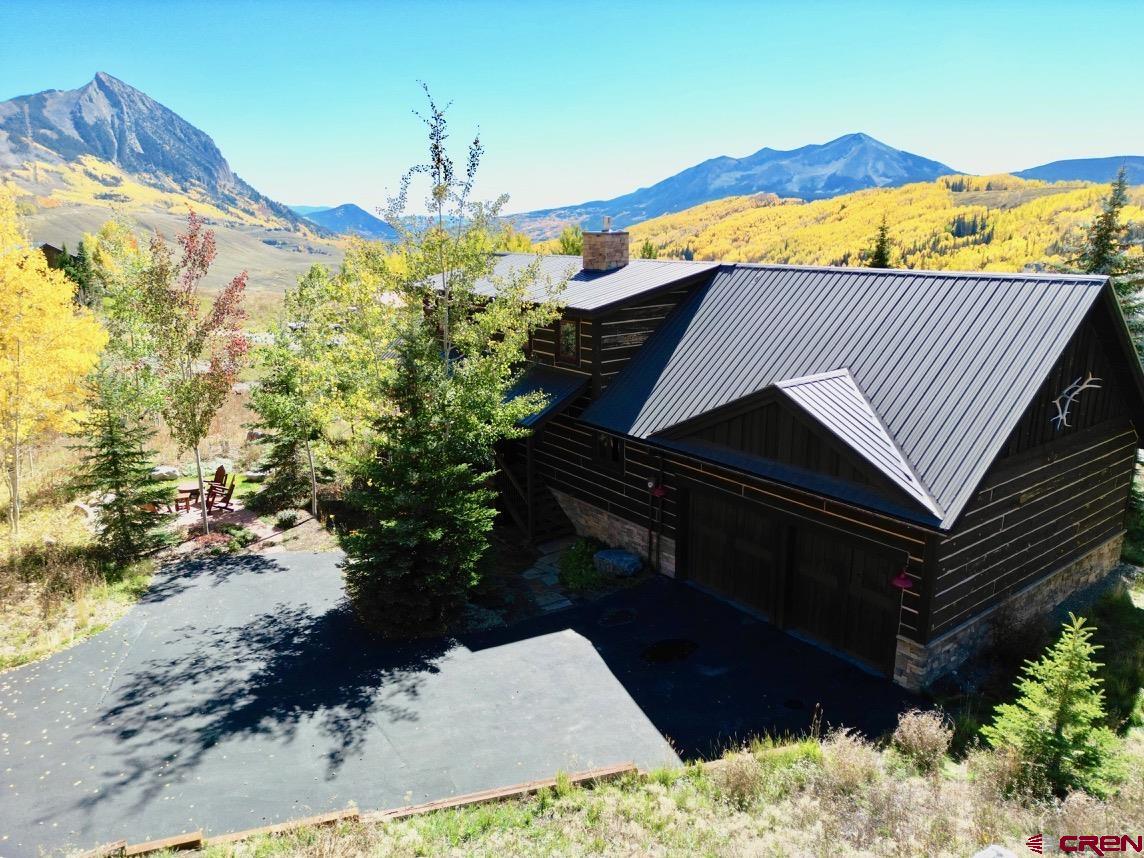 450 Meridian Lake Drive Crested Butte, CO 81224 - Photo 12 of 45 a view of swimming pool with a yard