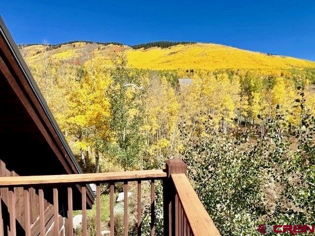 450 Meridian Lake Drive Crested Butte, CO 81224 - Photo 18 of 45 a view of a balcony with an outdoor space