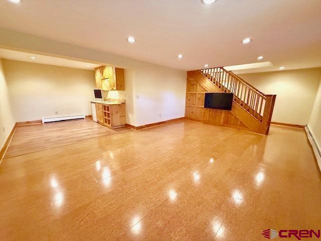 450 Meridian Lake Drive Crested Butte, CO 81224 - Photo 29 of 45 a view of an empty room with wooden floor
