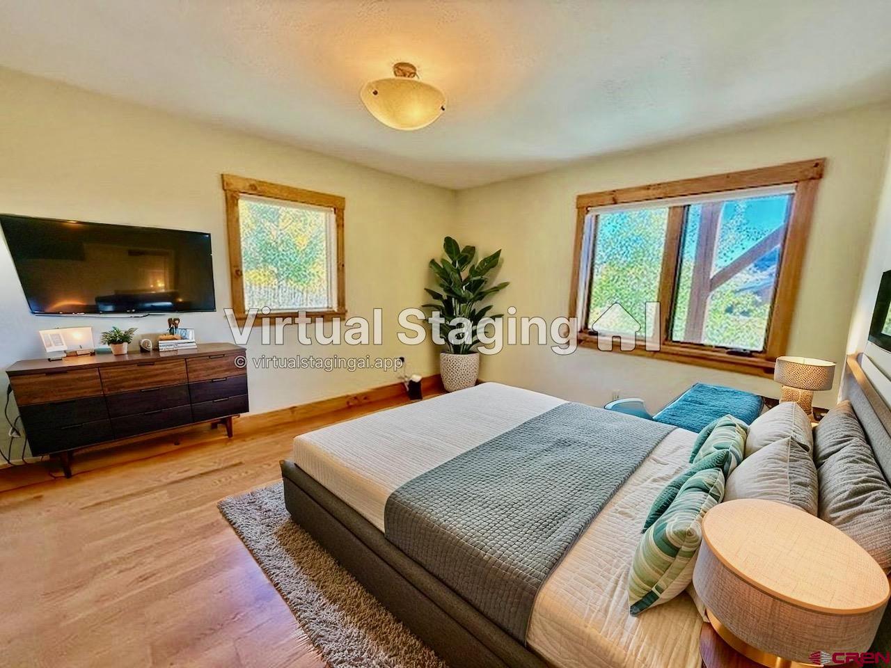 450 Meridian Lake Drive Crested Butte, CO 81224 - Photo 44 of 45 a living room with furniture and a flat screen tv