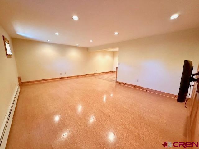 450 Meridian Lake Drive Crested Butte, CO 81224 - Photo 6 of 45 a view of a room with wooden floor and windows