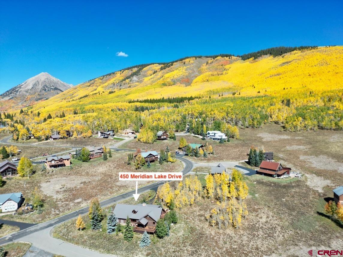 450 Meridian Lake Drive Crested Butte, CO 81224 - Photo 7 of 45 a view of a swimming pool with an ocean view