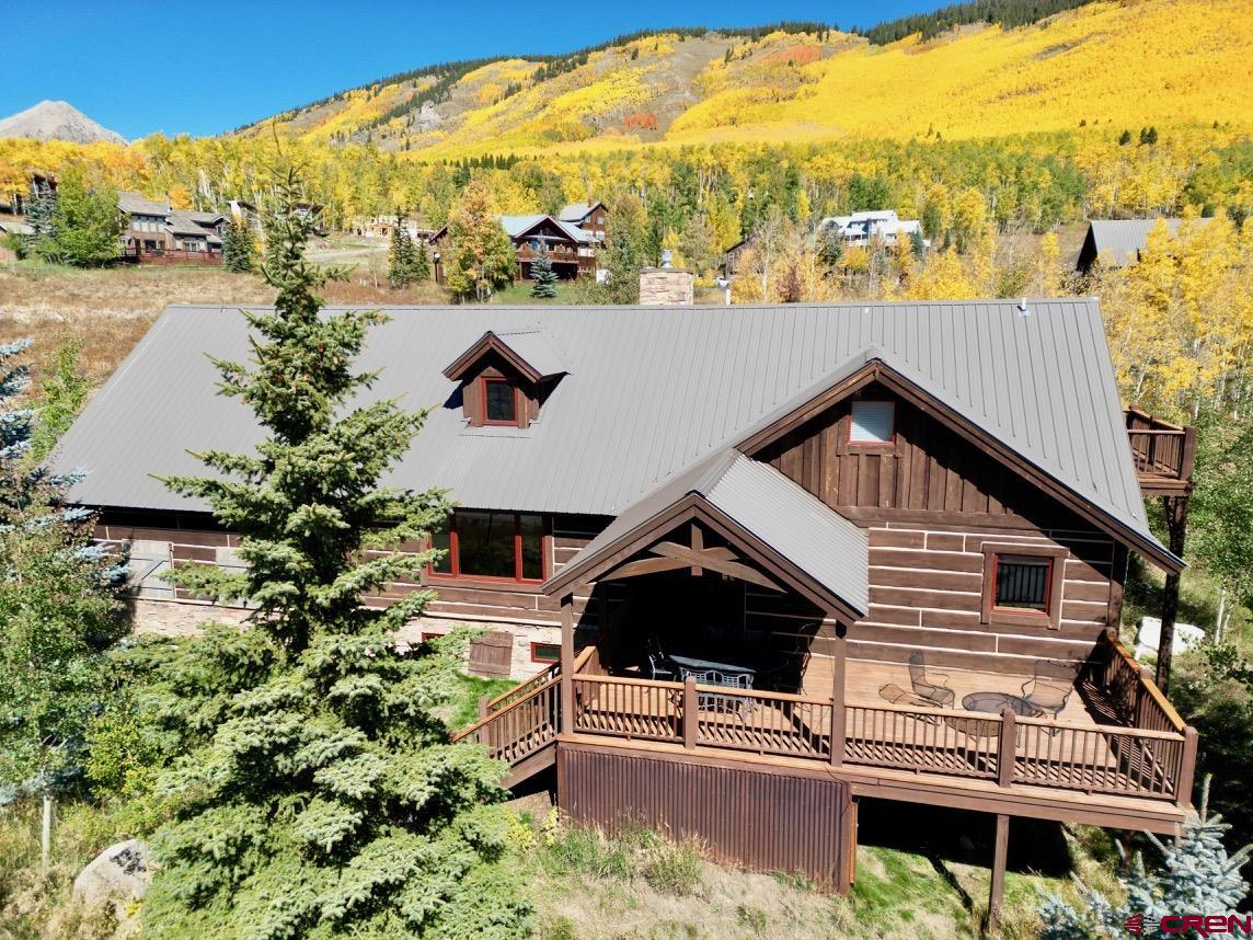 450 Meridian Lake Drive Crested Butte, CO 81224 - Photo 8 of 45 a view of a house with a ocean view