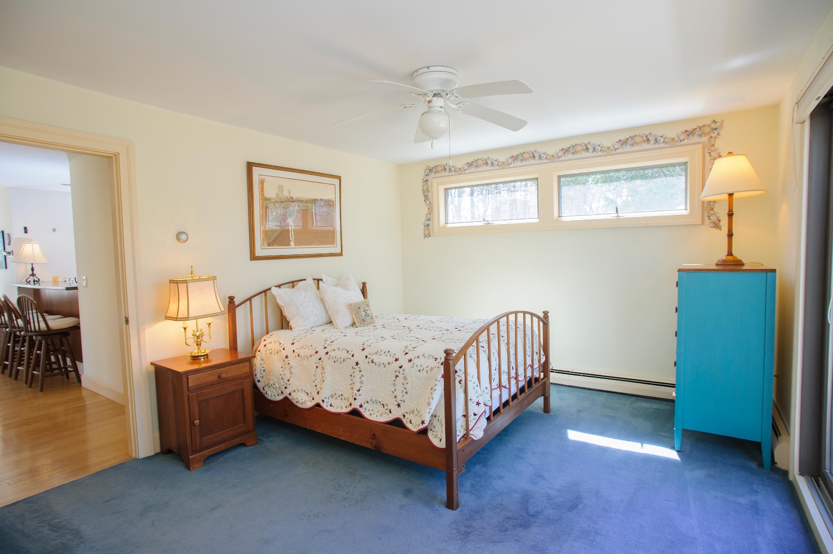 237 Lagoon Pond Road Vineyard Haven, MA 02568 - Photo 12 of 21 a bed room with a bed and a chair