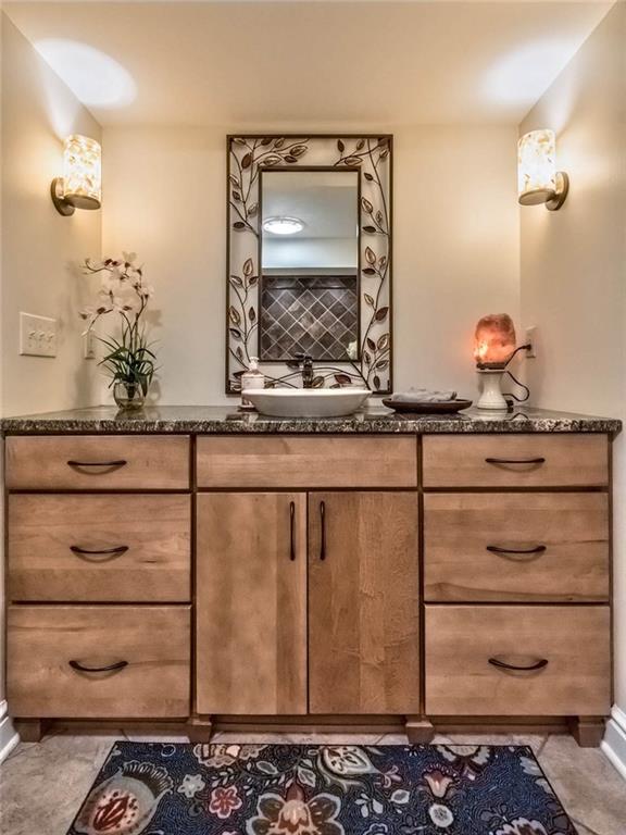183 Davidson Road Mars, PA 16046 - Photo 14 of 25 4th full bathroom on the LL with tiled-in shower! (as seen in the mirror) Granite luxury vanity with vessel sink.