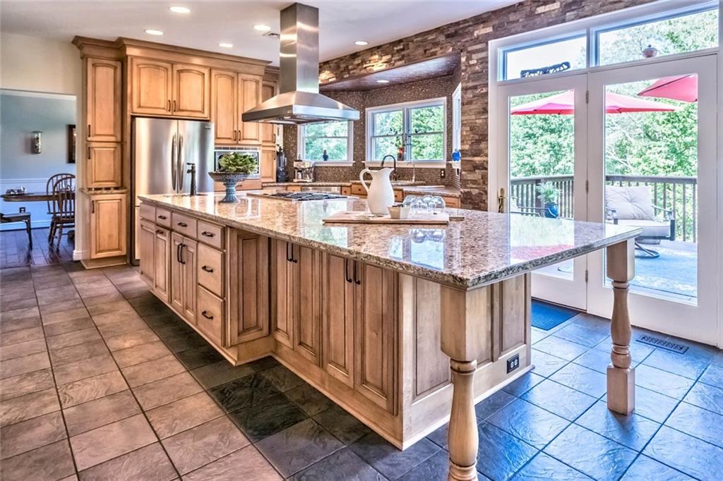 183 Davidson Road Mars, PA 16046 - Photo 3 of 25 Completely renovated kitchen with gourmet 6 burner gas cooktop and stainless steel hood, convection oven, and even part of the kitchen tile floor is heated!