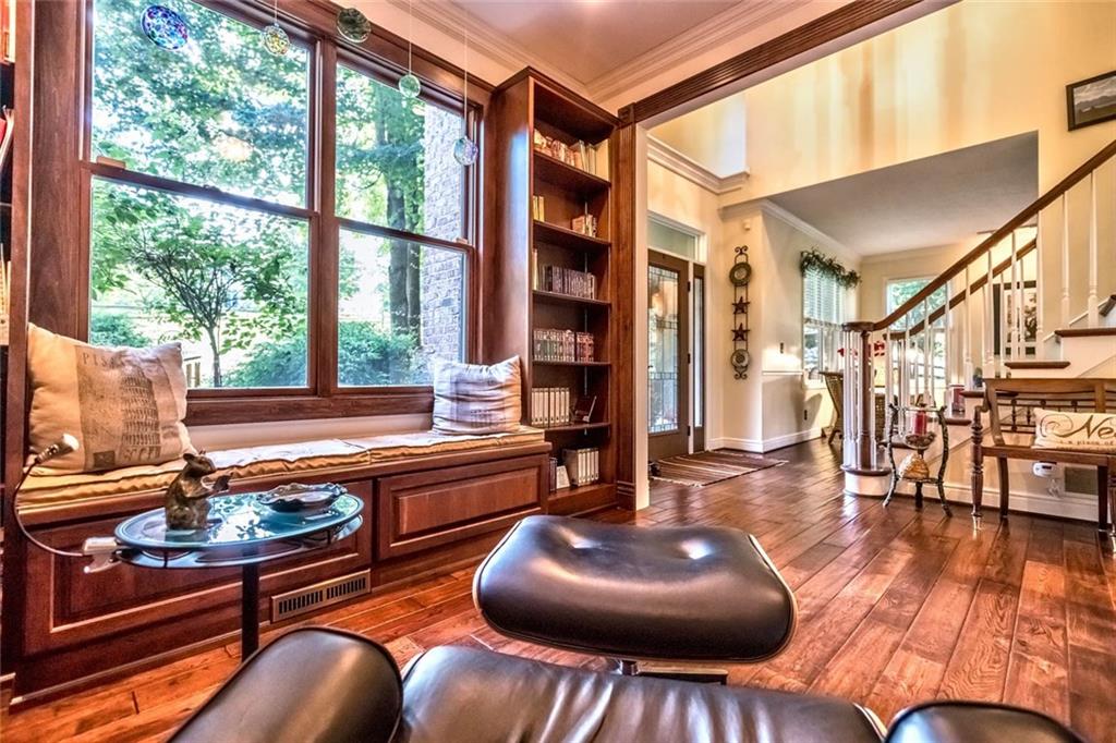 183 Davidson Road Mars, PA 16046 - Photo 8 of 25 Wonderful view and setting is found in the formal front study with built-in window bench seat and three walls of bookshelves. The high ceilings and crown molding give a stately feel!