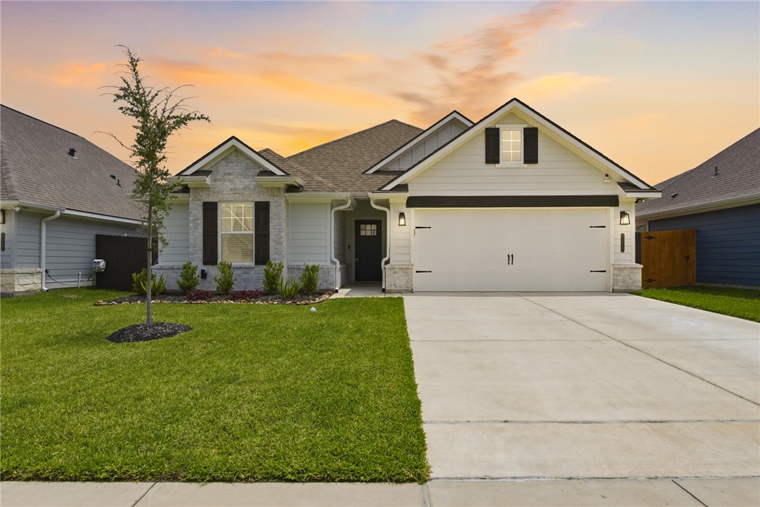 3112 Margaret Rudder Parkway Bryan, TX 77808 - Photo 24 of 24 a view of a front of house with a yard